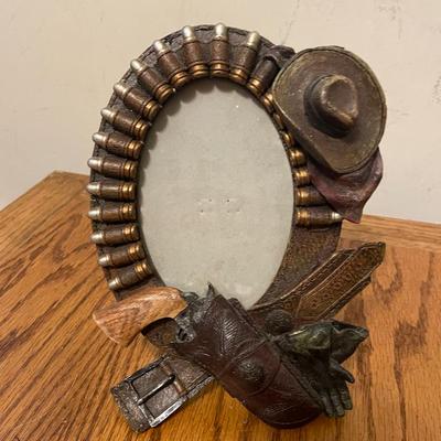 Western-Themed Oval Picture Frame With Decorative Elements
