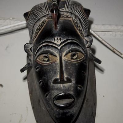 Hand-Carved African Tribal Mask with Bird Motif