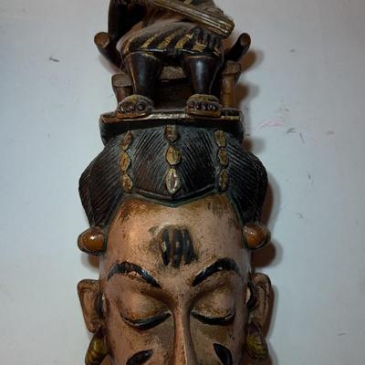 Hand-Carved Tribal Mask with Seated Figure