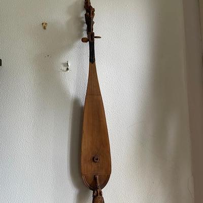 Carved Wooden Traditional String Instrument with Figurative Details