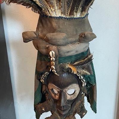 African Tribal Mask with Feathers and Cowrie Shells