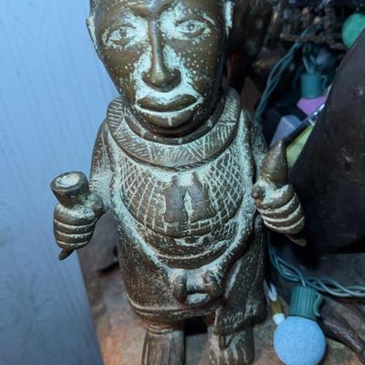 Bronze Figurine with Tribal Styling and Intricate Details
