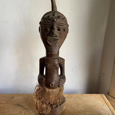 Wooden Tribal Statue with Decorative Elements