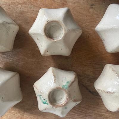 Six White Ceramic Star-Shaped Vases