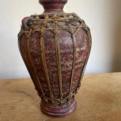 Red Handcrafted Ceramic Bottle with Woven Rattan Details