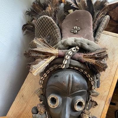African Ceremonial Mask with Textile and Feather Details