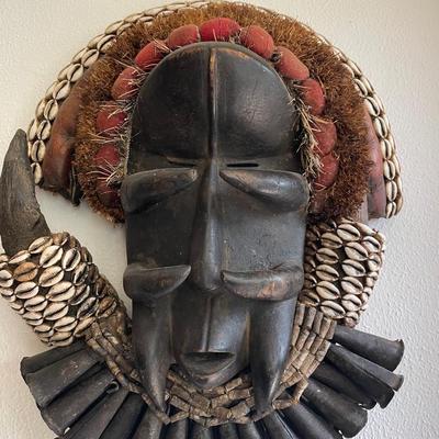 African Tribal Mask with Cowrie Shells and Fiber Details