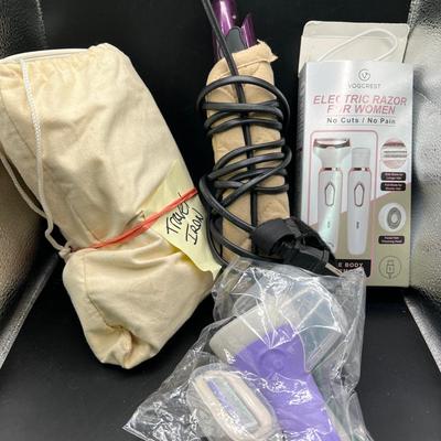 Travel Beauty Goods including Purple Twilight Hair Straightener with Heat Pouch