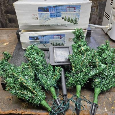 (2) Sets Of 4 Solar Lighted Tree Stakes