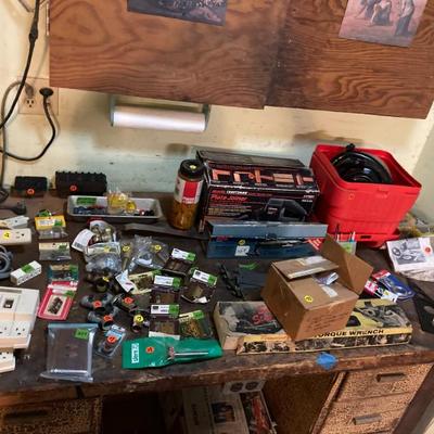 variety of plumbing supplies, power cords, misc tools