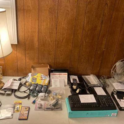 computer stuff, APC back-up, surge protectors, wi-fi extenders