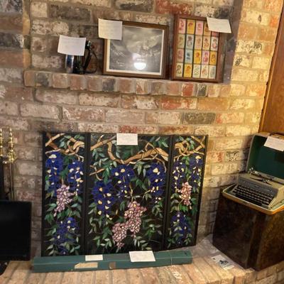 Tiffany fire screen, Royal portable typewriter, Ansel Adams print