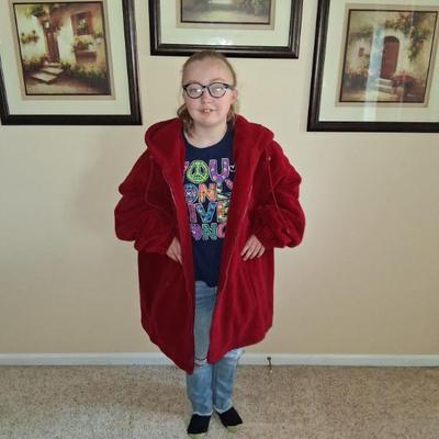 My special needs granddaughter modeling a very cool Vintage Coat.