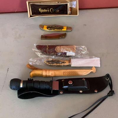 Various Pocket Knives and Survival/Hunting Knives
