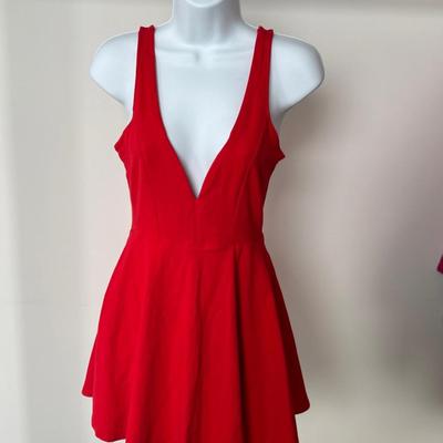 Two Petite Women’s Peplum Style Dresses
