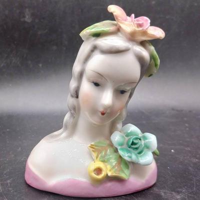 Head Adorned With Flowers Figurine