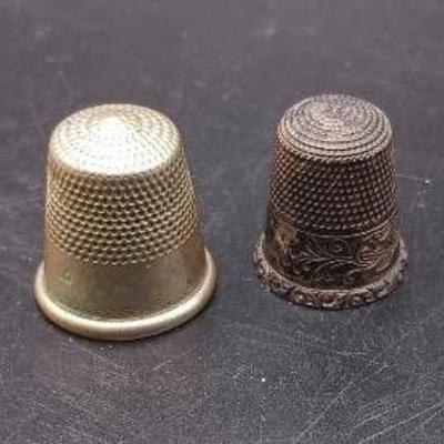 (2) Thimbles including Sterling Silver