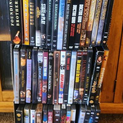 Mystery Lot of DVDs And CDs