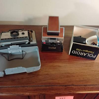 2 Vintage Polaroid Cameras And Flash Attachment