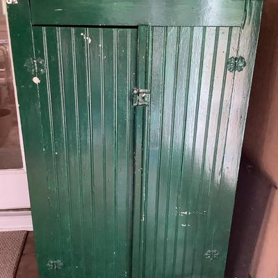 Green Painted Cabinet For Storage And Contents