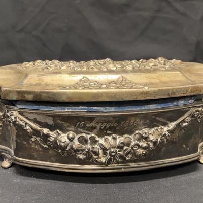 Silver Box with Blue Material Inside