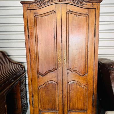 Antique Armoire with scrolls
