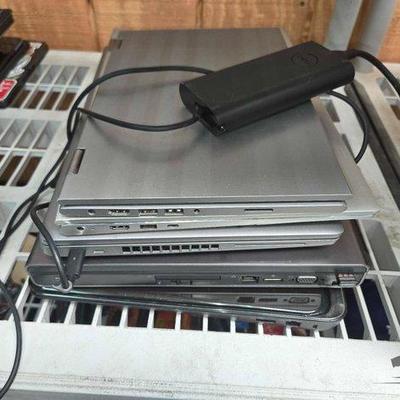 #2665 • (5) Dell Laptops & (1) Charger
