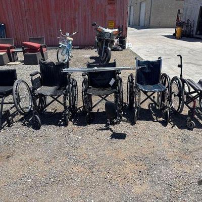 Sale Photo Thumbnail #400: #82000 • 5 Wheelchairs and Crutches
