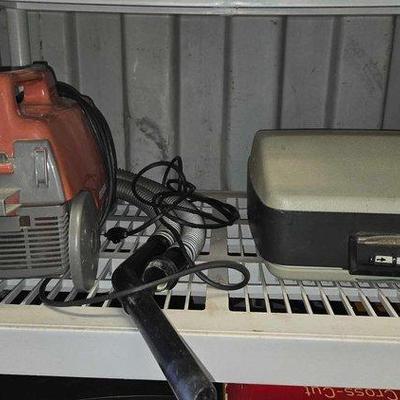 #4018 • Eureka Imperial 840 Vacuum Cleaner & Adler Typewriter Case
