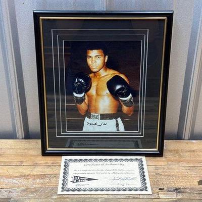Sale Photo Thumbnail #162: #1865 • Muhammad Ali Signed Photograph with COA
