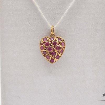 #604 • 18k Gold and Ruby Pendant, 1.3g
