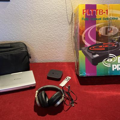 Turn Table, DVD Player, Apple TV, And Headphones 
