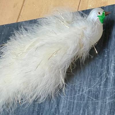 Blown glass bird ornaments with feathers
