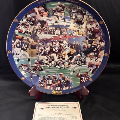 Lot 238: Danbury Mint “Super Bowl XXXVI Champions – New England Patriots” Porcelain Collector Plate.