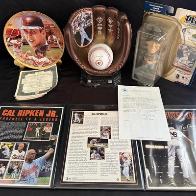 Lot 409: Cal Ripken Jr. Collector Lot – Autographed Ball, Plate, Bobblehead, Stamps, & More! 