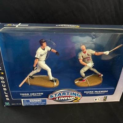 Lot 203: Starting Lineup 2 “Classic Doubles” Set Featuring Todd Helton, Mark McGwire