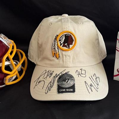 Lot 437: Washington Redskins Autographed Memorabilia Lot – Signed Helmet (Moss), Hat & Ornament (Ker