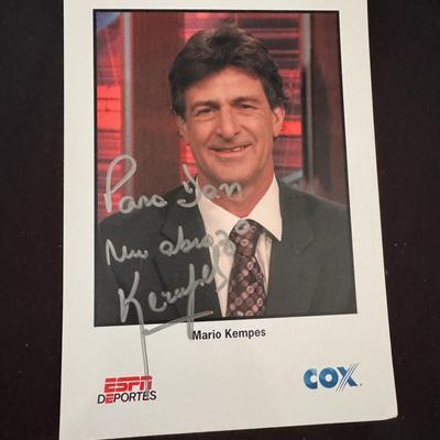Lot 217: Autographed photo of Mario Kempes, a legendary Argentine soccer player.