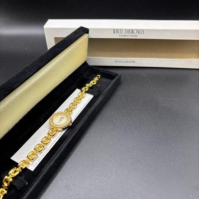 Sale Photo Thumbnail #43: Vintage "White Diamonds Collection" By Elizabeth Taylor Watch