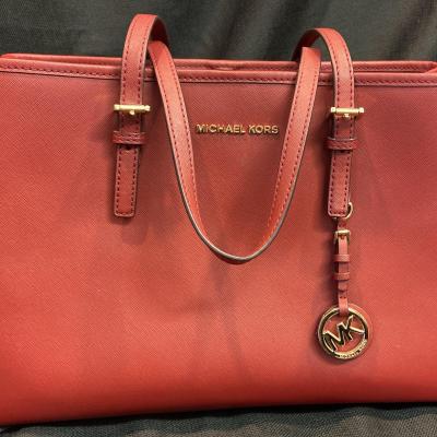 Authenticated Michael Kors Coral/Red Handbag/Tote