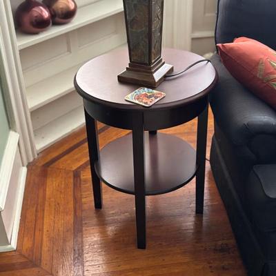 Two matching end tables and lamps.