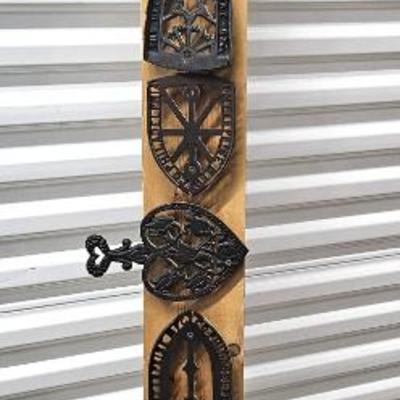 Impressive Display of Vintage and Antique Cast Iron Trivets Nailed on a 5ft Long Board