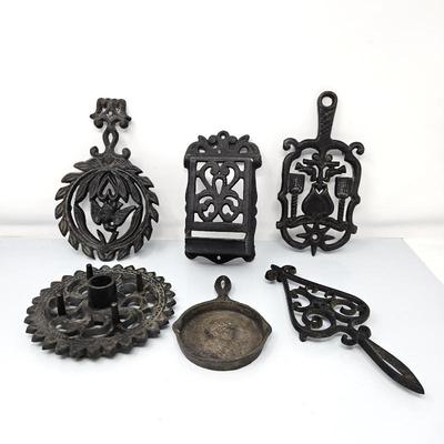 Charming assortment of vintage cast iron kitchen Trivets, Candle Holder, & Match Dispenser - Wilton