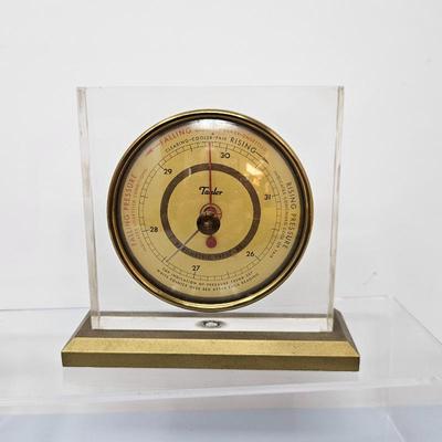 Lot #28 - Vintage Taylor barometer in a Lucite Casing and Gold-Tone Base 4" x 4"