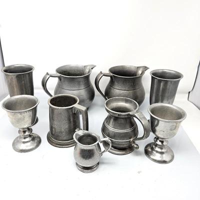 Lot #23 - Set of 9 Pewter Pieces Mostly Made in the USA. Two Water Pitchers, Steins, Goblets & Smaller Pitchers