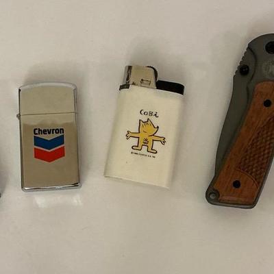 NRA Pocket Knives, Zippo Chevron & Colibri Lighters, & More