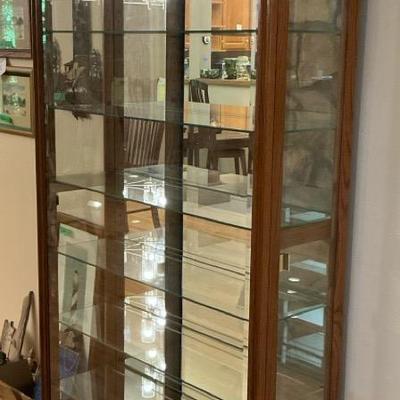 Howard Miller Hardwood Illuminated Collectibles Cabinet 