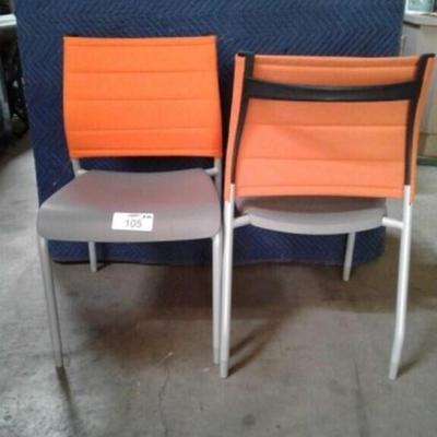 Side chrome chairs, mid back seat in orange color, with chrome frame design