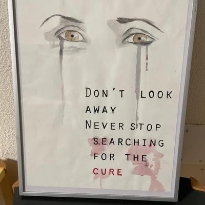 Framed Artwork Depicting Eyes With Text Message