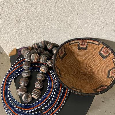 African Woven Basket, Maasai Beaded Necklace, and Strand of Large Striped Beads